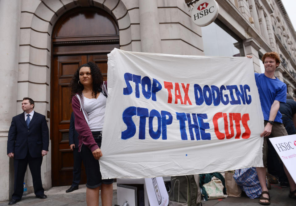 UK Uncut protesters demonstrate outside a branch of the HSBC Bank in London's Regent Street where they created temporary food banks highlighting the 500,000 people who now rely on food handouts.