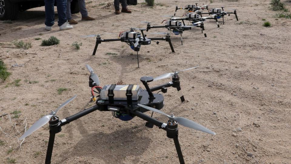 HIVE unmanned aircraft systems prepares to take flight during a human-machine integration experiment during Project Convergence at Fort Irwin, Calif., on March 11, 2024.  The drones provide service members on the ground with real-time situational awareness. (Sgt. Gianna Chiavarone/U.S. Army)