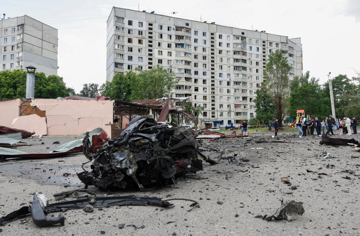 <span>The aftermath of Russian shelling of a residential area in Kharkiv, Ukraine.</span><span>Photograph: Sergey Kozlov/EPA</span>