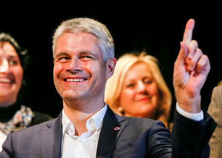 FILE PHOTO: Laurent Wauquiez, the front-runner for the leadership of French conservative party "Les Republicains" (The Republicans) attends a political rally in Saint-Priest, near Lyon, France, December 7, 2017. REUTERS/Robert Pratta/File photo