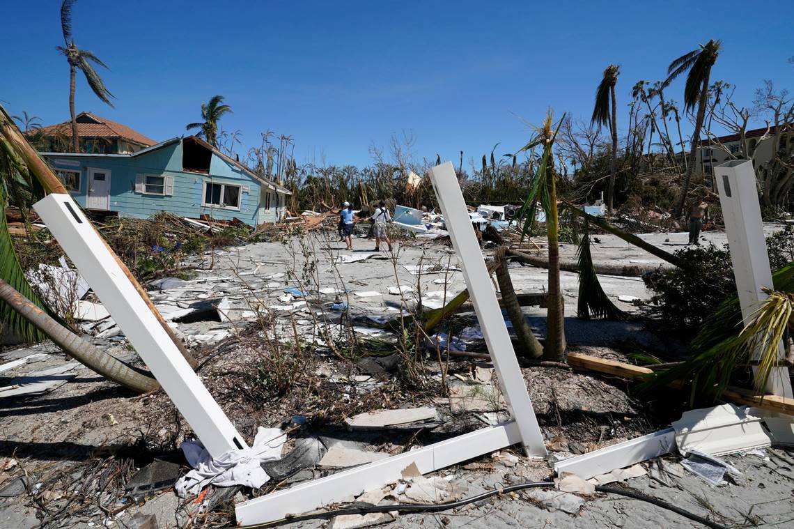 Damaged homes are seen, after Hurricane Ian moved through, Friday, Sept. 30, 2022, on Sanibel Island, Fla. (AP Photo/Steve Helber)