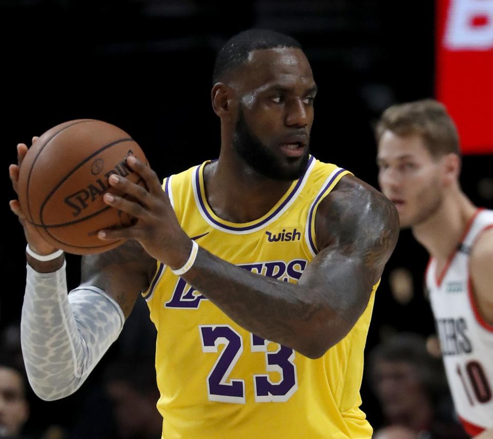 Lakers forward LeBron James looks for an open teammate.