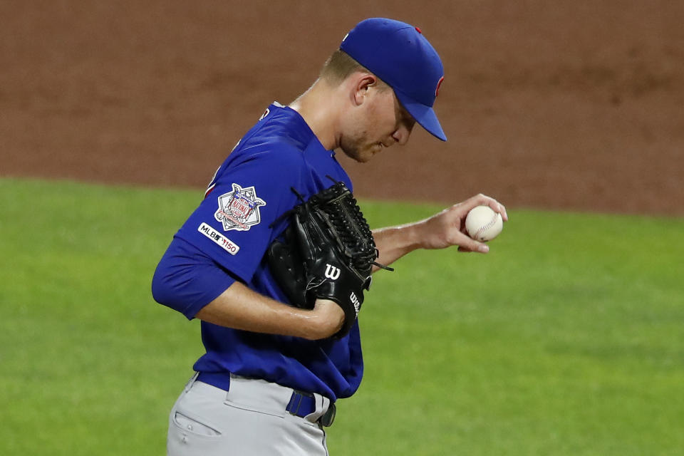 Chicago Cubs relief pitcher Mike Montgomery collects himself on the mound after giving up a three-run home run to Pittsburgh Pirates' Adam Frazier during the fourth inning of a baseball game in Pittsburgh, Tuesday, July 2, 2019. (AP Photo/Gene J. Puskar)