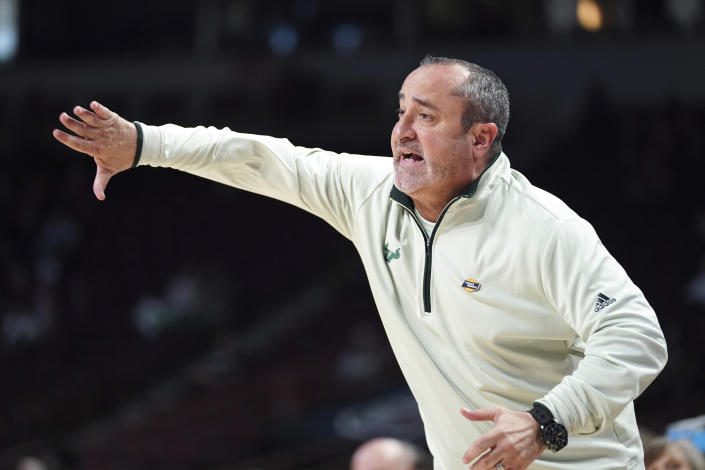South Florida head coach Jose Fernandez directs his team in the first half of a first-round college basketball game against Marquette in the NCAA Tournament, Friday, March 17, 2023, in Columbia, S.C. (AP Photo/Sean Rayford)