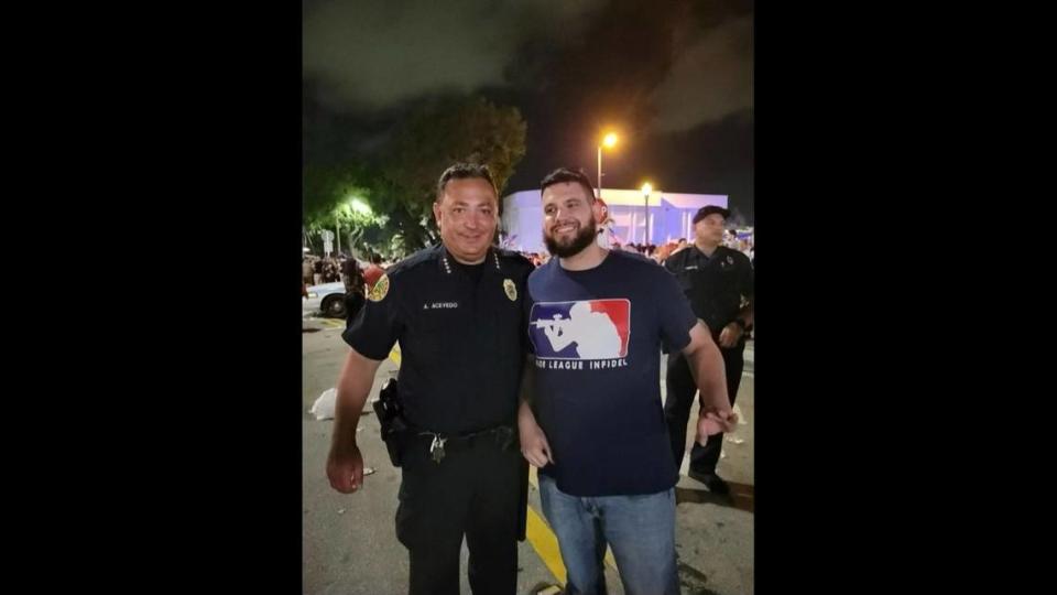 Miami Police Chief Art Acevedo poses with Proud Boys member Gabriel Garcia, who is facing trial for entering the U.S. Capitol on Jan. 6, 2021. Acevedo said he did not who Garcia was when he took the photo.