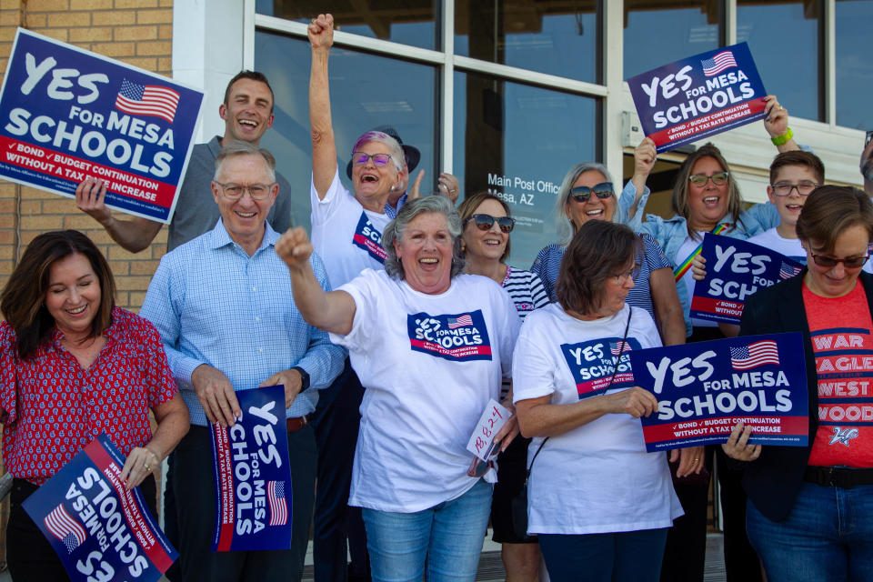 Marcie Hutchinson and supporters of "Yes for Mesa Schools" cheer for their accomplishment in Mesa on Oct. 10, 2023.