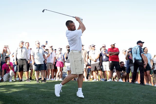 <p>Ezra Shaw/Getty </p> Travis Kelce golfing at Wynn Golf Club on June 29, 2023 in Las Vegas, Nevada.