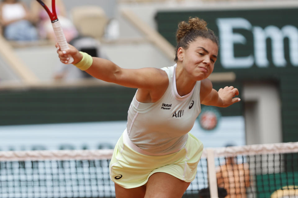 Italy's Jasmine Paolini plays a shot against Poland's Iga Swiatek during the women's final of the French Open tennis tournament at the Roland Garros stadium in Paris, France, Saturday, June 8, 2024. (AP Photo/Jean-Francois Badias)