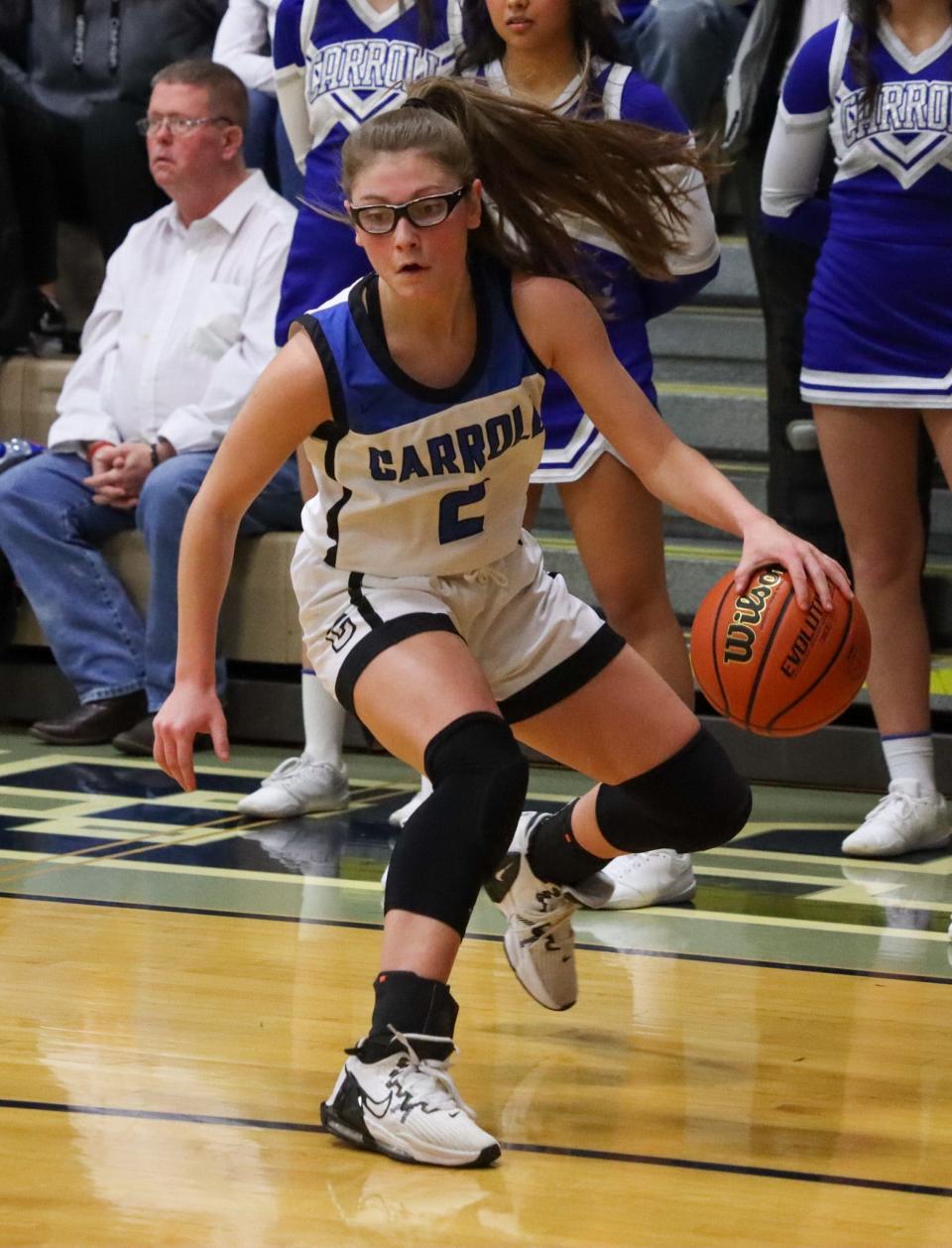 Alli Harness dribbles against Central Catholic on Saturday, Feb. 4, 2023.