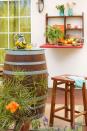 <p>Mount a folding shelf to the exterior of your house, and use it to hold party snacks, drinks or utensils.</p>