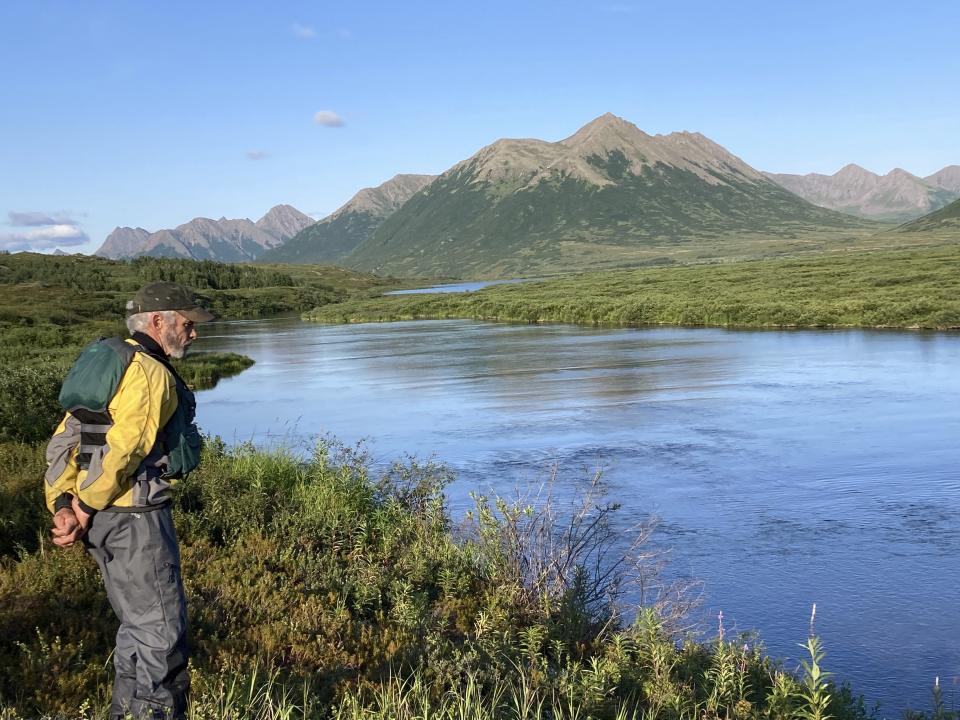 In this 2021 photo provided by Tom Kizzia, Dale Chorman stands in the mountains of the Togiak National Wildlife Refuge in Alaska. Chorman was killed by a moose Sunday, May 19, 2024, while attempting to photograph the animal and her newborn calves in Homer, Alaska. (Tom Kizzia via AP)