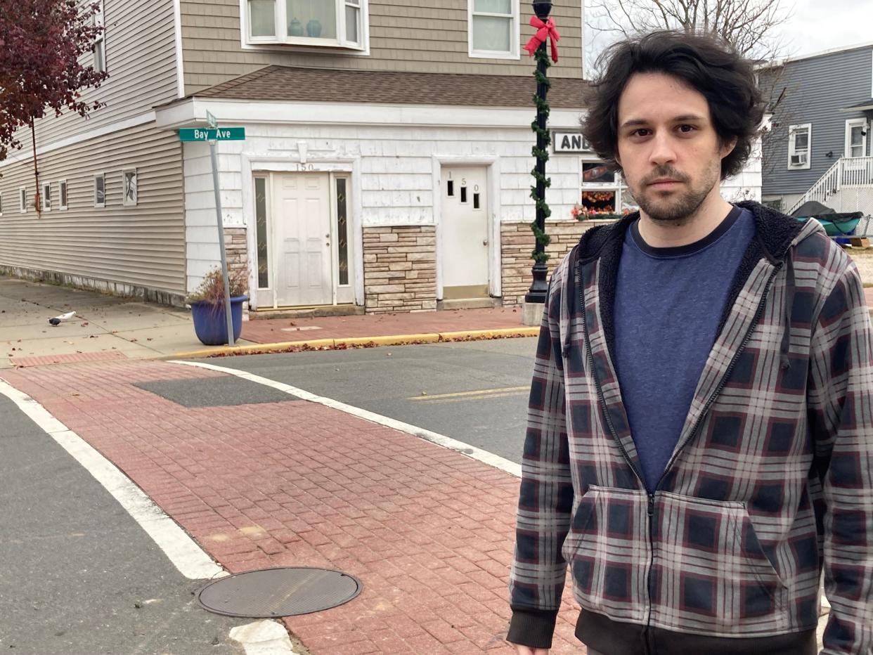 Jared Donnelly standing at the intersection in Highlands where he sustained a head injury after being struck by a car.