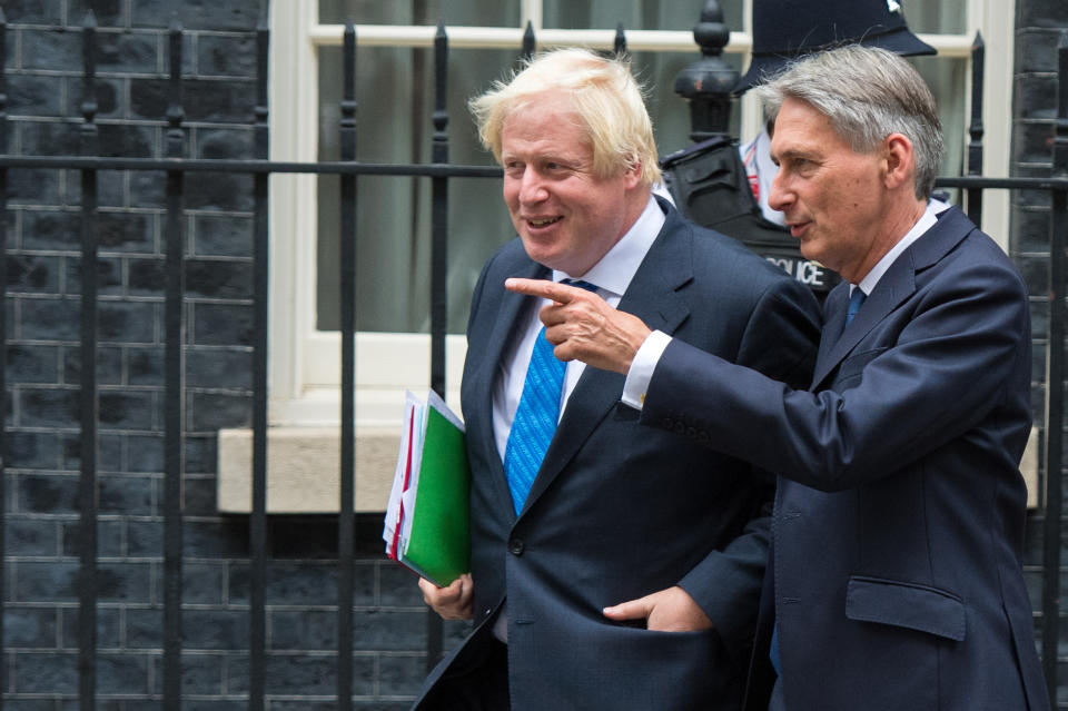 Boris Johnson and Philip Hammond leave the cabinet meeting at No.10 (Dominic Lipinski/PA Wire)