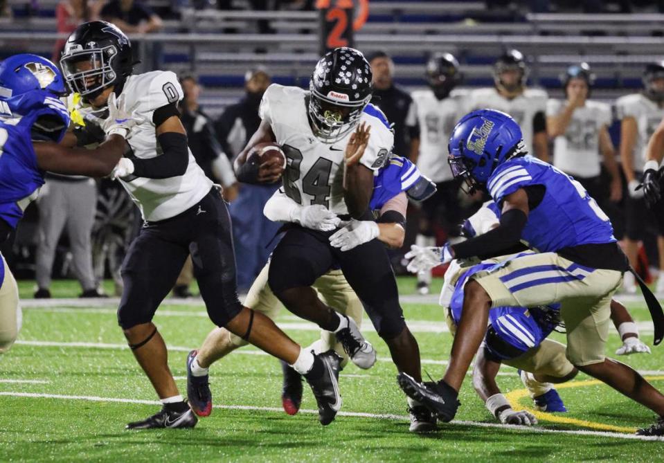 York’s Javarus Guthrie (24) is tackled Friday, Sept. 29, 2023 at the varsity game against York Comprehensive High School