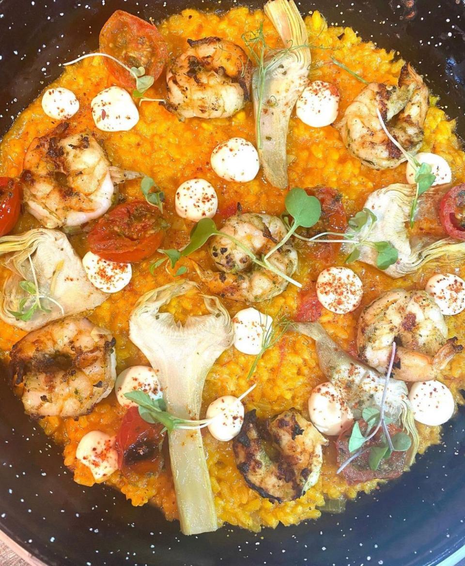 The spiced shrimp paella is just one of the many entree options on Avocado Grill's Valentine's Day menu.