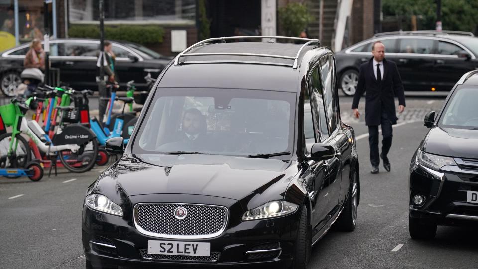 The hearse arrives at the funeral service of Derek Draper at St Mary the Virgin church in Primrose Hill