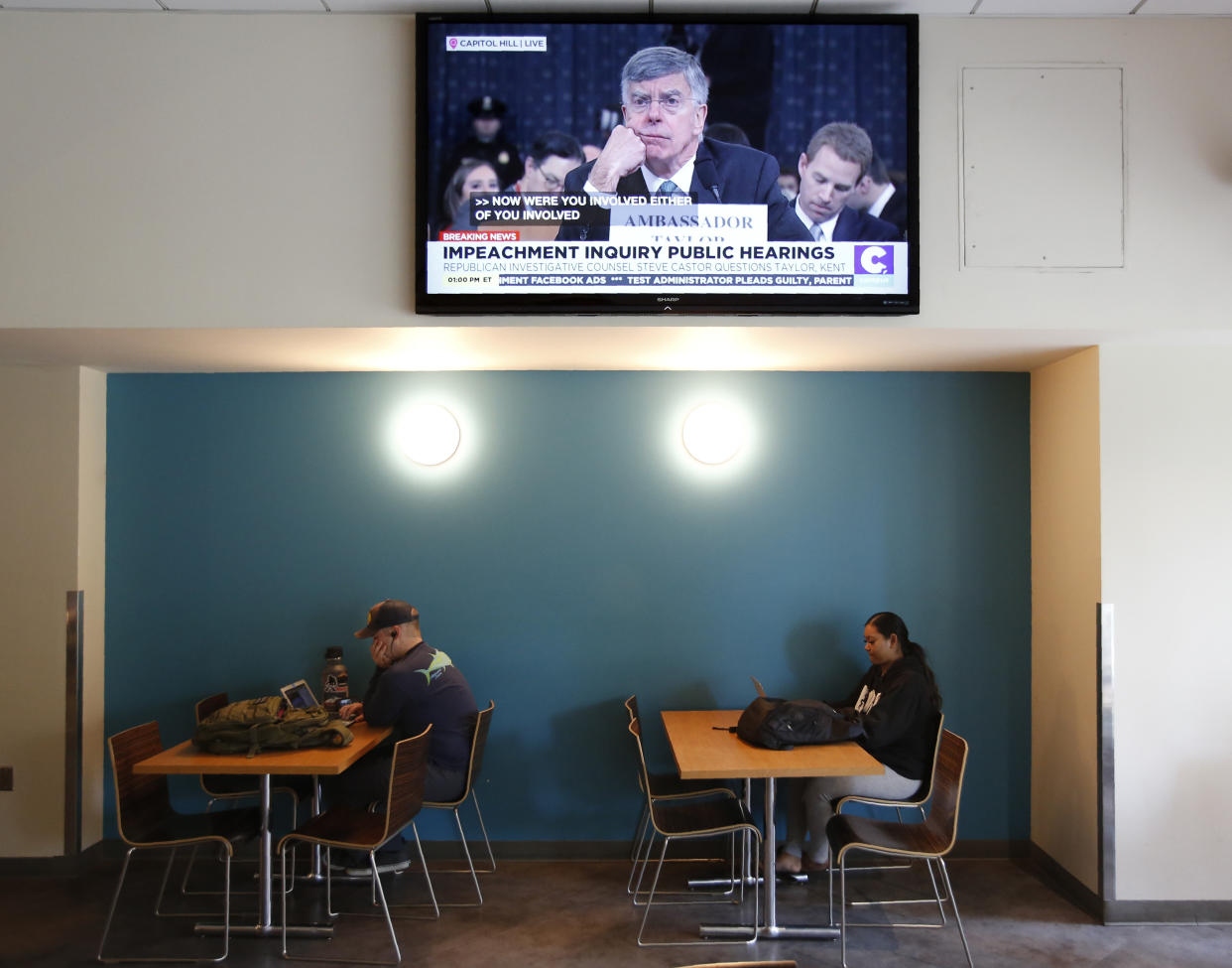 William Taylor, the top U.S. diplomat in the Ukraine, is seen testifying before the House Intelligence Committee on a television at California State University, Sacramento Wednesday, Nov. 13, 2019.&nbsp; (Photo: ASSOCIATED PRESS)