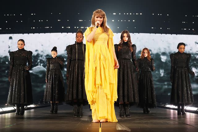 <p>Kevin Mazur/Getty</p> Taylor Swift performing the Eras Tour in Paris