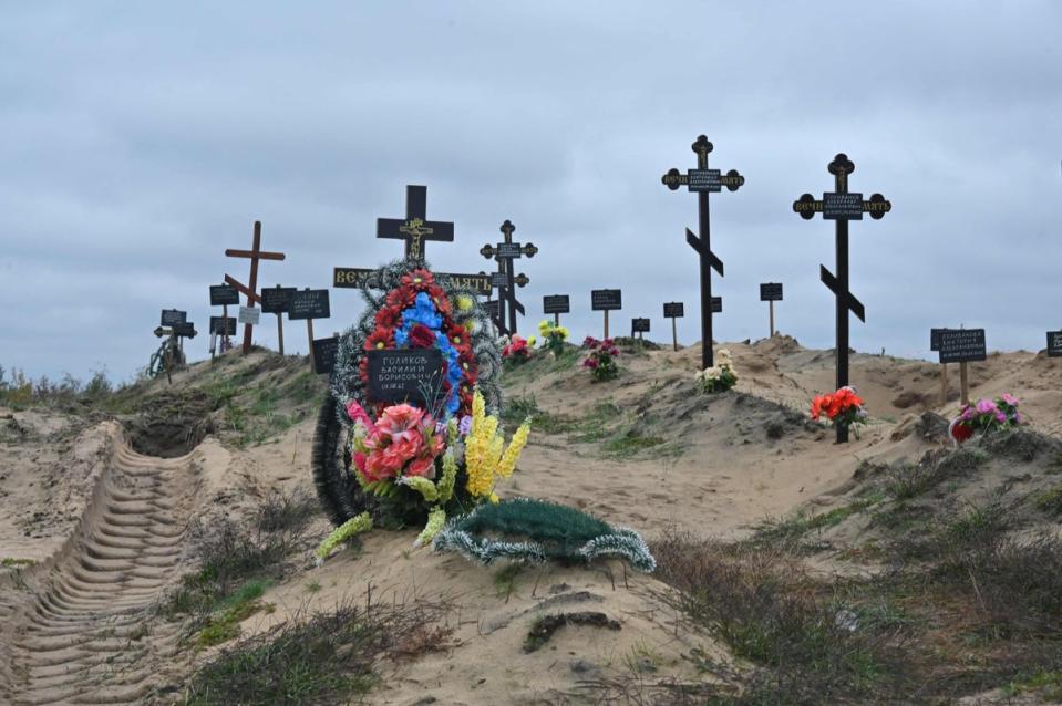 A mass grave for civilians at the cemetery near Lyman, Donetsk (AFP via Getty Images)