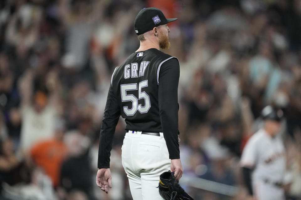 Colorado Rockies starting pitcher Jon Gray reacts after giving a three-run home run to San Francisco Giants' Brandon Belt in the fifth inning of a baseball game Saturday, Sept. 25, 2021, in Denver. (AP Photo/David Zalubowski)
