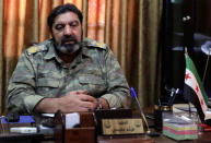 Colonel Haitham Afisi talks during an interview with Reuters at his office in the town of Azaz, Syria August 6, 2018. REUTERS/ Khalil Ashawi