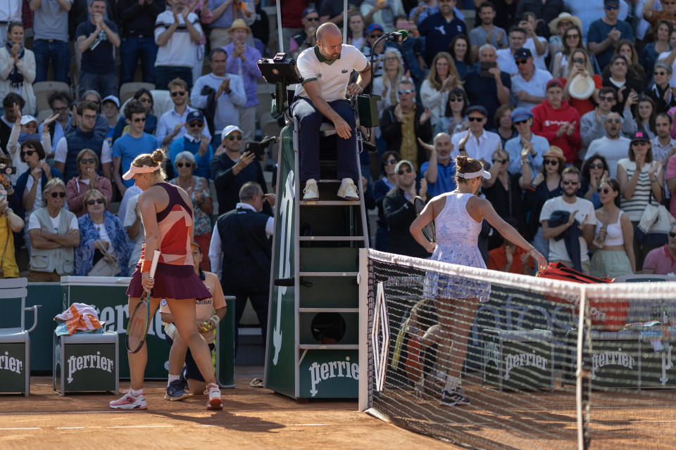 Elina Svitolina of Ukraine, right, and Anna Blinkova of Russia did not shake hands after their match on June 2 during the 2023 French Open in Paris. / Credit: Tim Clayton/Corbis via Getty Images