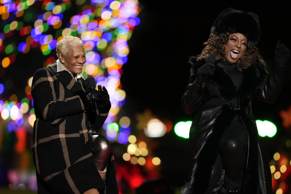 Dionne Warwick and Ledisi perform after President Joe Biden and first lady Jill Biden lit the National Christmas Tree on the Ellipse, near the White House in Washington, Thursday, Nov. 30, 2023. (AP Photo/Mark Schiefelbein)