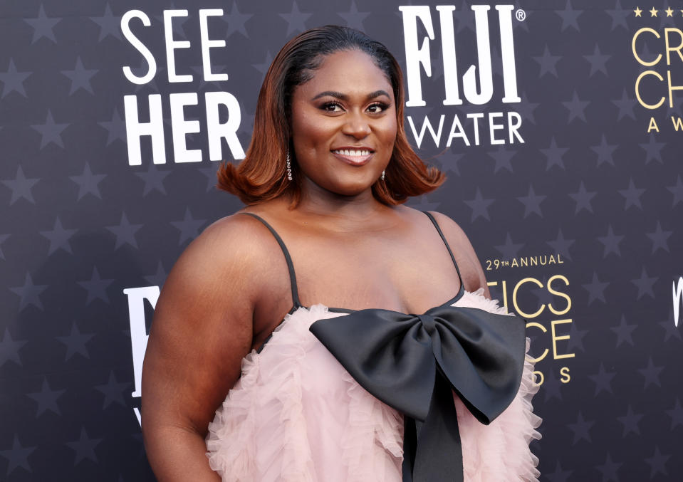 When Danielle Brooks’ Oscar nomination was announced, it was 2:30 a.m. and her husband was the only person who could wake her up.“I’m in New Zealand,” she told the Hollywood Reporter. “I thought I had put my phone off ‘do not disturb,’ but it went back on ‘do not disturb’ in the middle of the night, so I fell asleep. My husband is the only one who can get to me on ‘do not disturb,’ so he called and told me, ‘You did it, babe. You did it.’ My daughter’s four, she’s like, ‘Mommy, you did it.’”In a sleepy haze, Danielle opened her phone to see “over like 200 text messages.” Then she called Oprah. “She’s been here before,” she said, “and this is my first time experiencing this.”