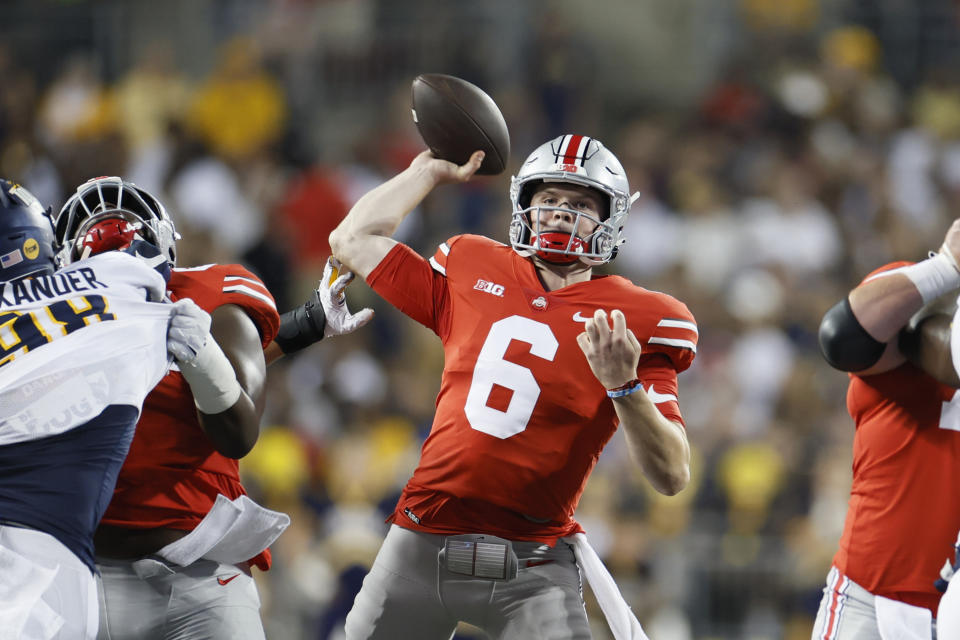 FILE - Ohio State's Kyle McCord plays against Toledo during an NCAA college football game Saturday, Sept. 17, 2022, in Columbus, Ohio. With two-year starter C.J. Stroud off to the NFL, the competition for a new starting quarterback takes center stage as Ohio State begins spring practice. (AP Photo/Jay LaPrete, File)