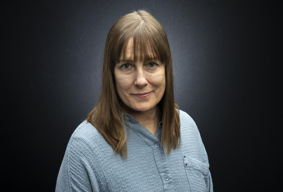 This March 16, 2020 photo shows TV producer and film director Leslie Thomas posing for a portrait in Los Angeles. On March 14, Thomas was one step closer to the Hollywood dream. Tickets were sold out for the 250-seat theater set to screen her indie comedy "Honesty Weekend" at the Pasadena Film Festival. Thomas said only 30 to 35 people showed up because they were terrified of the coronavirus. A day later, the Los Angeles mayor ordered cinemas closed in response to the coronavirus outbreak. (Photo by Willy Sanjuan/Invision/AP)