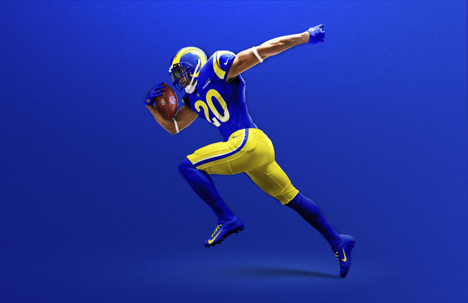 This undated graphic image released by the Los Angeles Rams NFL football team shows a model in their 'royal' uniform color scheme. The Rams unveiled new uniforms ahead of their move into SoFi Stadium this year. (Los Angeles Rams via AP)