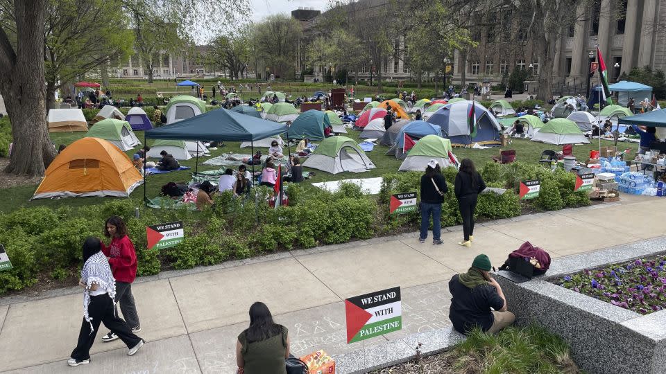 Dozens of tents and people are photographed on day two of an encampment in support of Palestinians at the University of Minnesota's campus in Minneapolis, Minn., on Tuesday, April 30, 2024. - Trisha Ahmed/AP