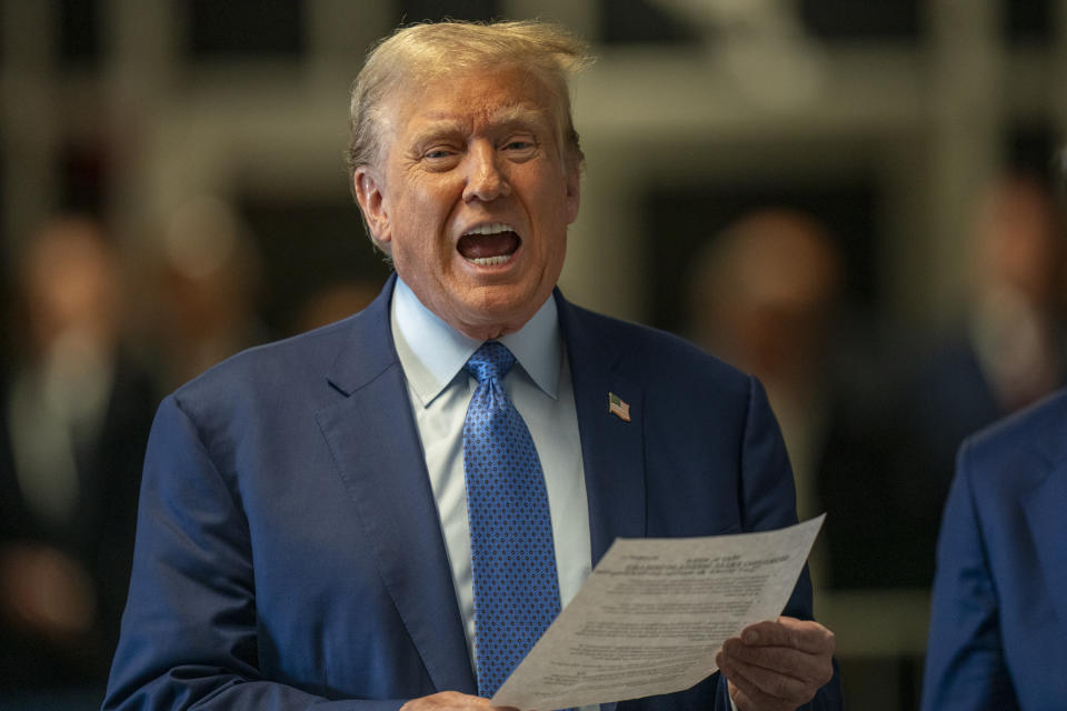 Former President Donald Trump speaks to reporters as he arrives for his trial at Manhattan Criminal Court, Thursday, May 9, 2024, in New York. (Steven Hirsch/New York Post via AP, Pool)