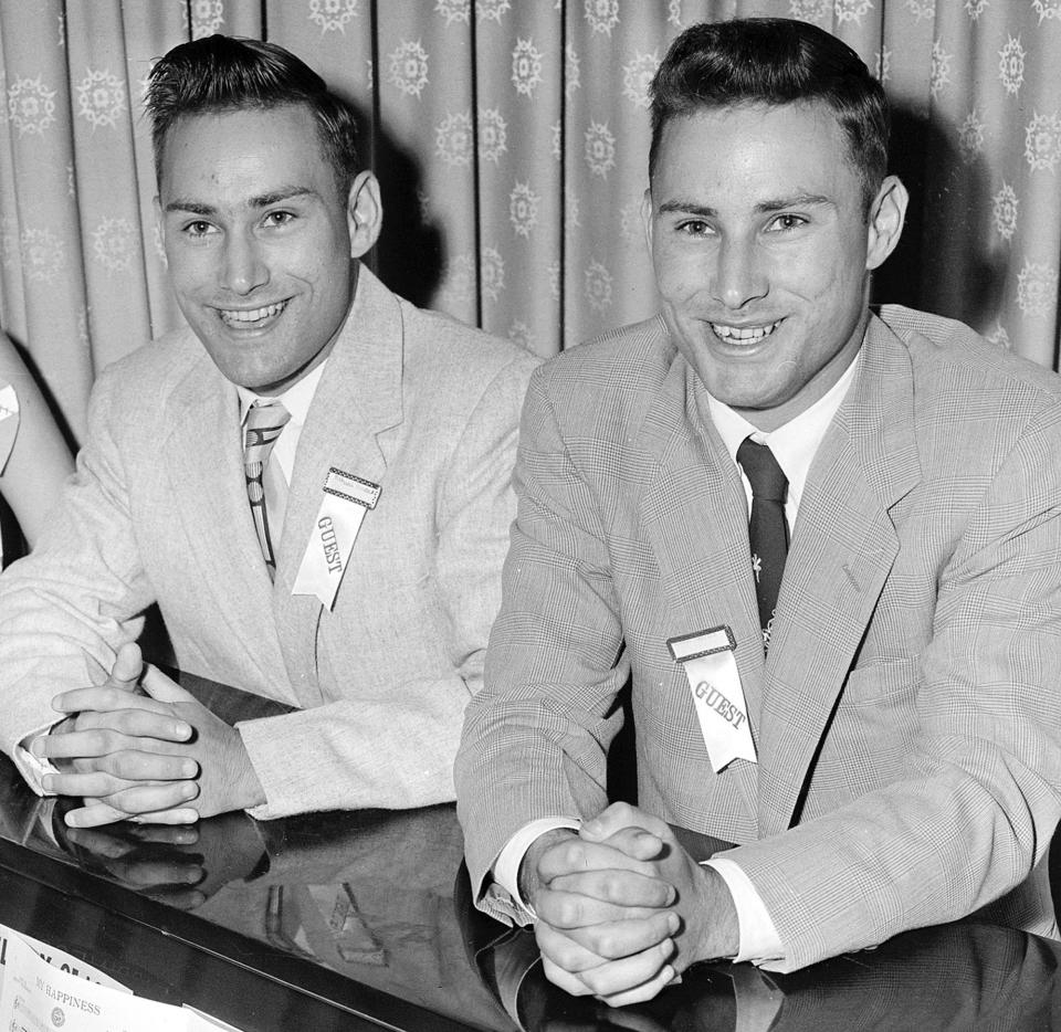 In this June 4, 1955, file photo, Richard Herrick, left, and his twin brother Ronald, from Northborough, Mass., sing at the annual meeting of the Mended Hearts Club at a hotel in Boston. The identical twin brothers made medical history when Ronald donated one of his kidneys to Richard for a Dec. 23, 1954, kidney transplant recognized as the world's first successful organ transplant.