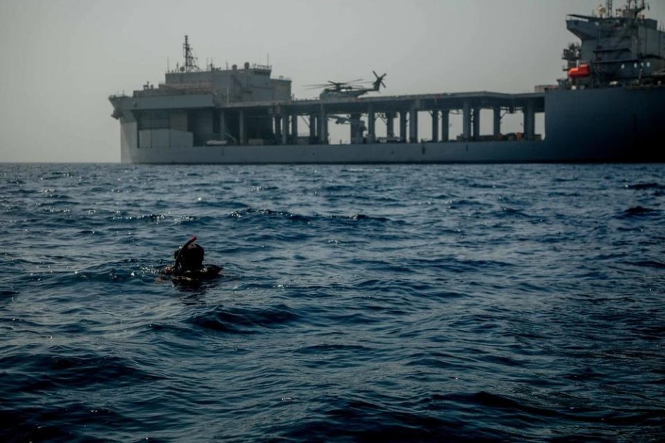 An electricians mate participates in search-and-rescue training