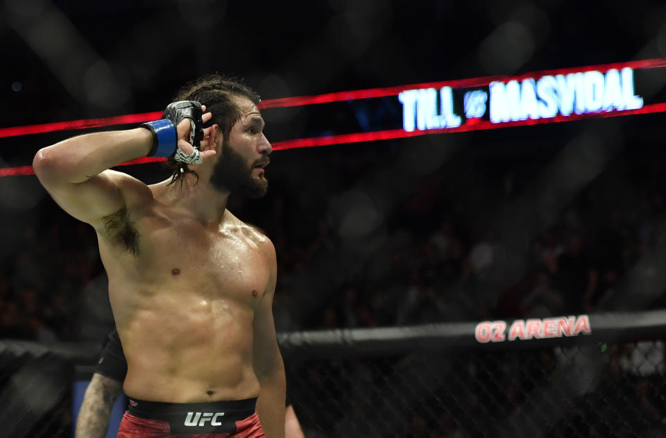 Mar 16, 2019; London, UK; Jorge Masvidal (blue gloves) and Darren Till (red gloves) during UFC Fight Night at O2 Arena. Mandatory Credit: Steve Flynn-USA TODAY Sports