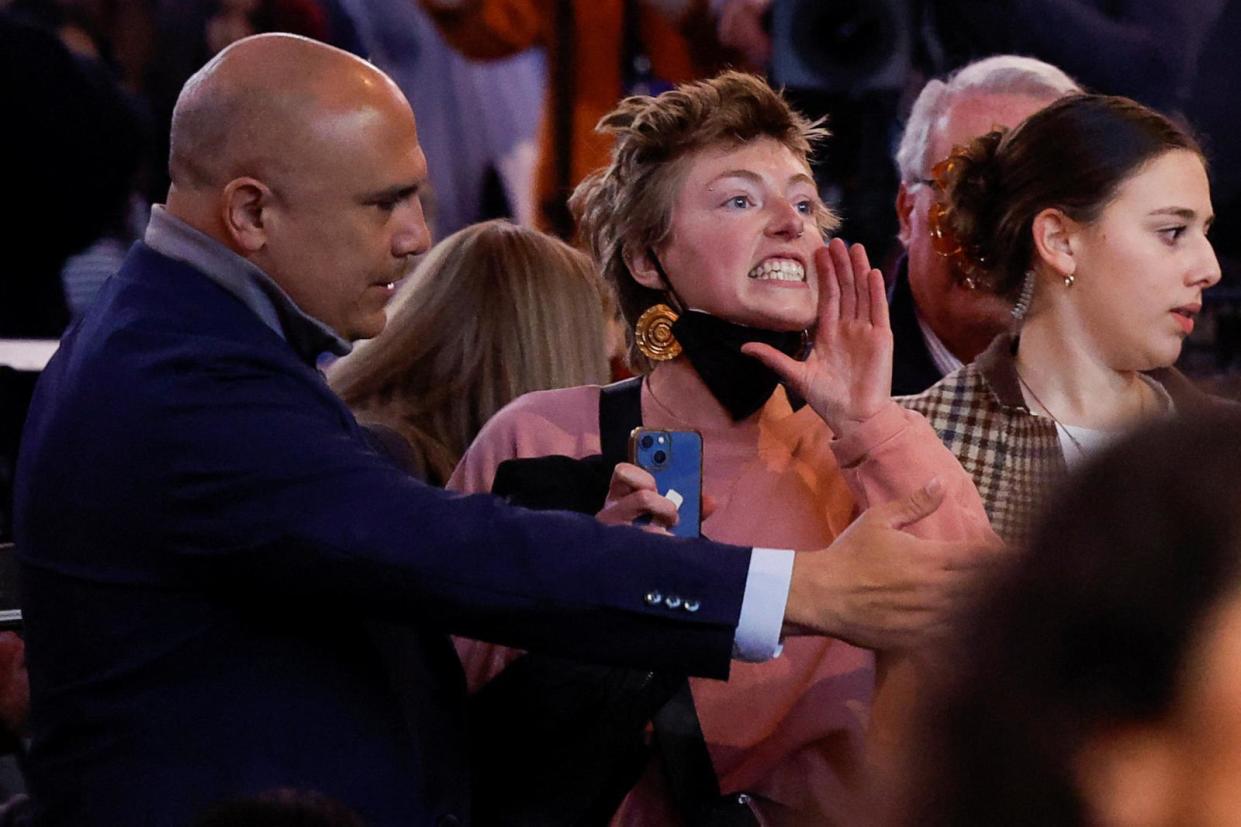 PHOTO: A demonstrator interrupts President Joe Biden during a campaign event focusing on abortion rights in Manassas, Va., Jan. 23, 2024.  (Evelyn Hockstein/Reuters)