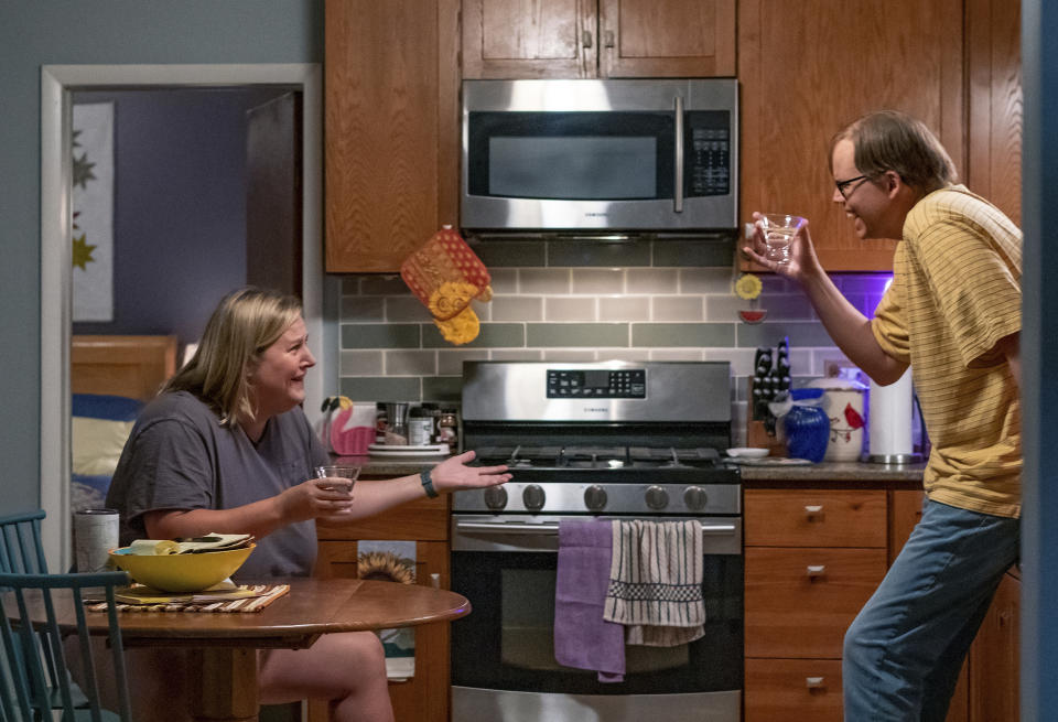 This image released by HBO shows Jeff Hiller, right, and Bridget Everett in a scene from the comedy series "Somebody Somewhere." (HBO via AP)