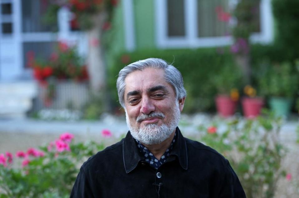 Afghan presidential candidate Abdullah Abdullah speaks during an interview with The Associated Press at his residence in Kabul, Afghanistan, Sunday, April 20, 2014. New partial results released in Afghanistan's presidential election show candidate Abdullah Abdullah is still the front-runner, though a runoff election looks likely. The winner will replace Hamid Karzai, the only president the country has known since the 2001 U.S.-led invasion ousted the Taliban, and will oversee a tumultuous period during which the U.S. and NATO forces are expected to withdraw most of their troops from the country. (AP Photo/Massoud Hossaini)