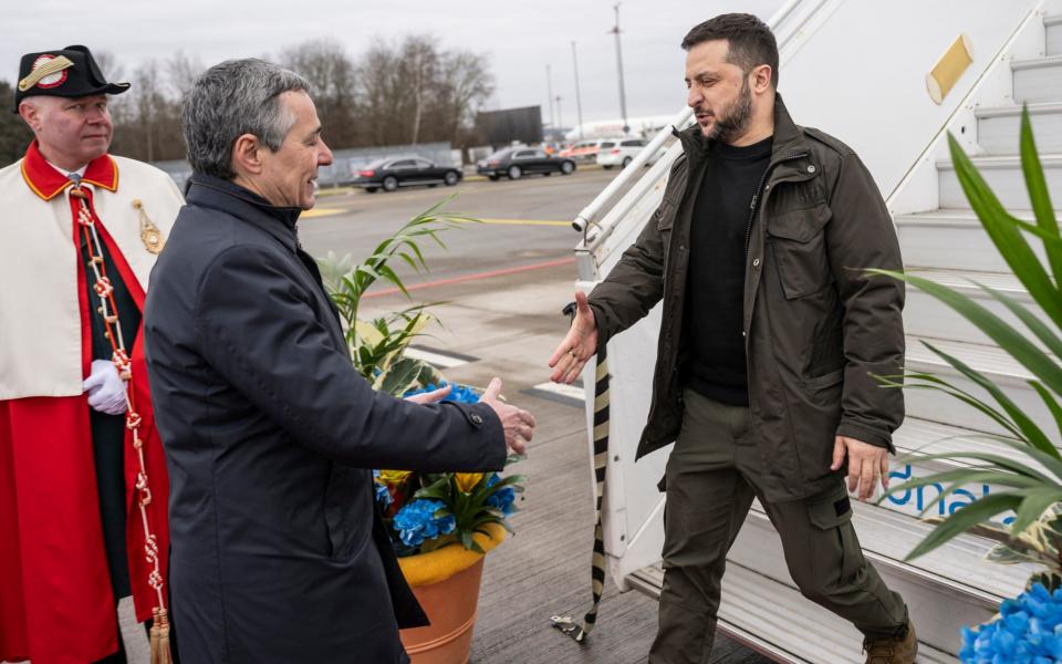 Volodymyr Zelensky is welcomed by Swiss foreign minister Ignazio Cassis at Zurich airport