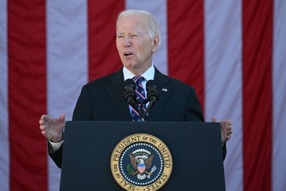 US President Joe Biden speaks at the Memorial Amphitheater in Arlington National Cemetery during celebrations for Veterans Day, on11  November 2023, in Arlington, Virginia. (AFP via Getty Images)