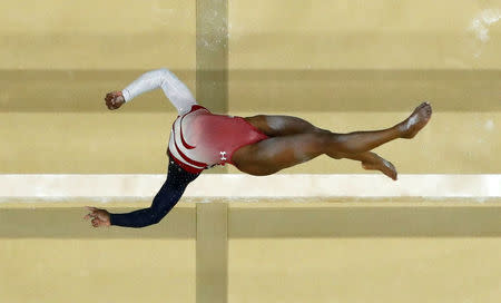 Simone Biles competes on the balance beam. REUTERS/Fabrizio Bensch