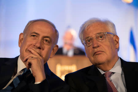 Israeli Prime Minister Benjamin Netanyahu (L) and David Friedman , the new United States Ambassador to Israel attend an event marking the 50th anniversary of Israel's capture of East Jerusalem during the 1967 Six-Day War, opposite the Old City wall and near the Tower of David in Jerusalem May 21, 2017. REUTERS/Abir Sultan/Pool