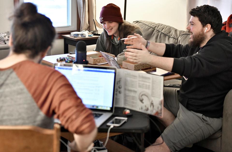 From left, Nicholas Prescott, 21, Lucas Davey, 22, and Austin Anderson, 21, all of Plymouth, N.H., get together every Sunday to play an old-school game, Dungeons & Dragons, one of the retro items and experiences that are back in fashion.