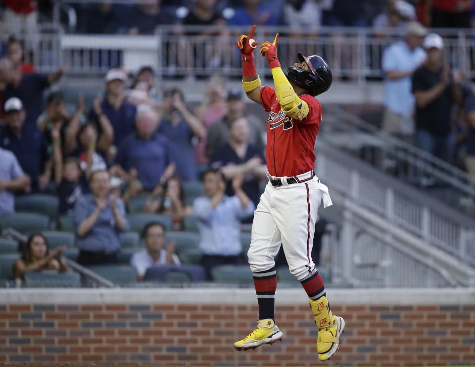 Atlanta Braves' Ronald Acuna Jr. celebrates after hitting a three-run home run off Washington Nationals' Erick Fedde during the second inning of a baseball game Friday, July 8, 2022, in Atlanta. (AP Photo/Ben Margot)