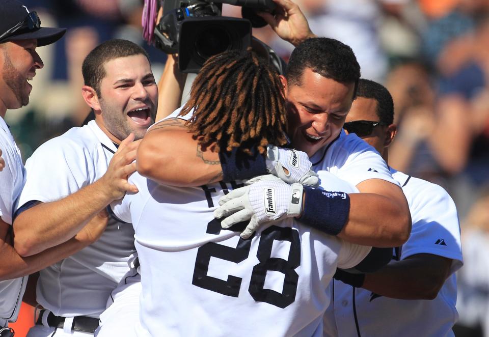 Detroit Tigers' Miguel Cabrera hugs teammate Prince Fielder (28) after hitting a walkoff home run off Cleveland pitcher Chris Perez during the tenth inning of a baseball game in Detroit on Sunday, Aug. 5, 2012.