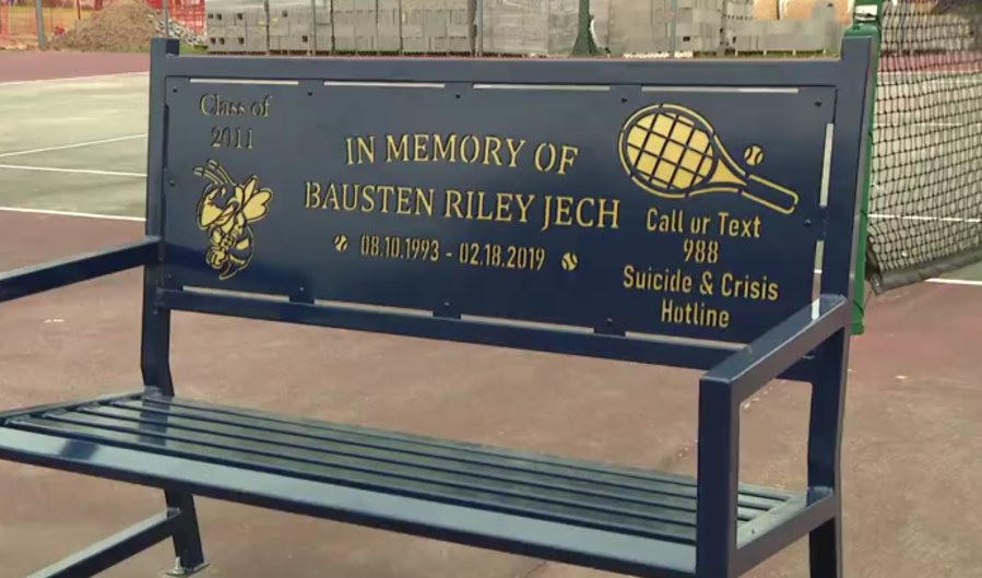 Bench with memorial saying "In memory of Bausten Riley Jech"