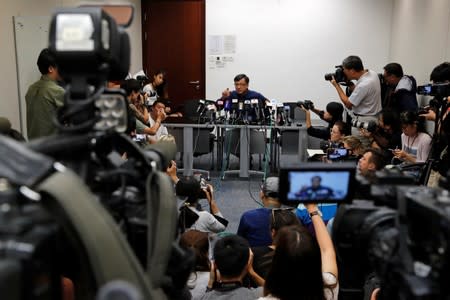 Pro-China lawmaker Junius Ho speaks during a news conference over the violence in Hong Kong