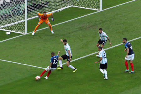 Soccer Football - World Cup - Round of 16 - France vs Argentina - Kazan Arena, Kazan, Russia - June 30, 2018 France's Kylian Mbappe scores their third goal REUTERS/Pilar Olivares