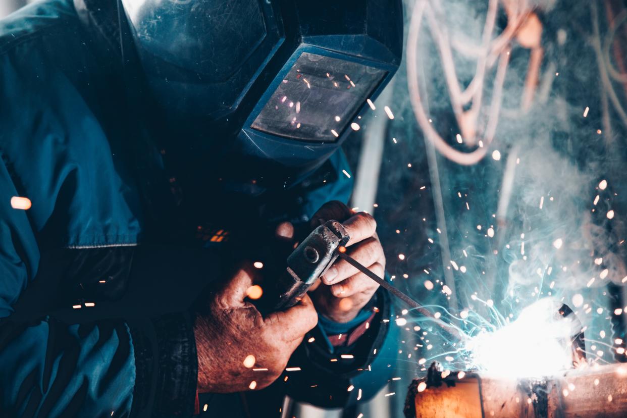 Engineers and blue collar workers are high in demand across the UK right now. Photo: Christopher Burns/Unsplash